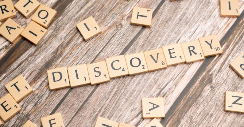 Breakthroughs - The word discovery spelled out in scrabble letters