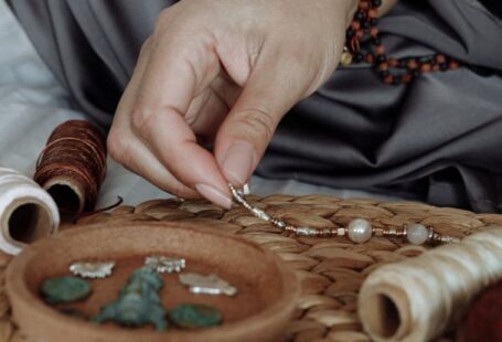 Self-Healing Materials - Person Making Bracelets With Beads
