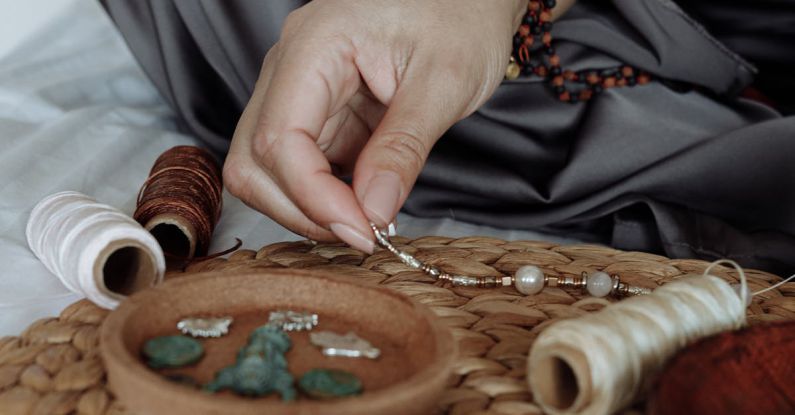 Self-Healing Materials - Person Making Bracelets With Beads