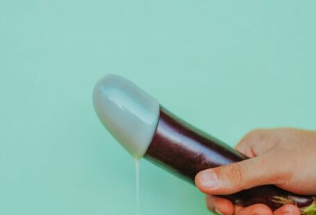 Lubricant - Person Holding a Eggplant