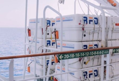 Safety Protocols - A large white container on the deck of a ship